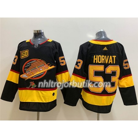 Män Ishockey Vancouver Canucks tröja Bo Horvat 53 Flying Skate 50th Anniversary Adidas 2019-20 Svart Authentic Män Ishockey Vancouver Canucks tröja Bo Horvat 53 Flying Skate 50th Anniversary Adidas 2019-20 Svart Authentic